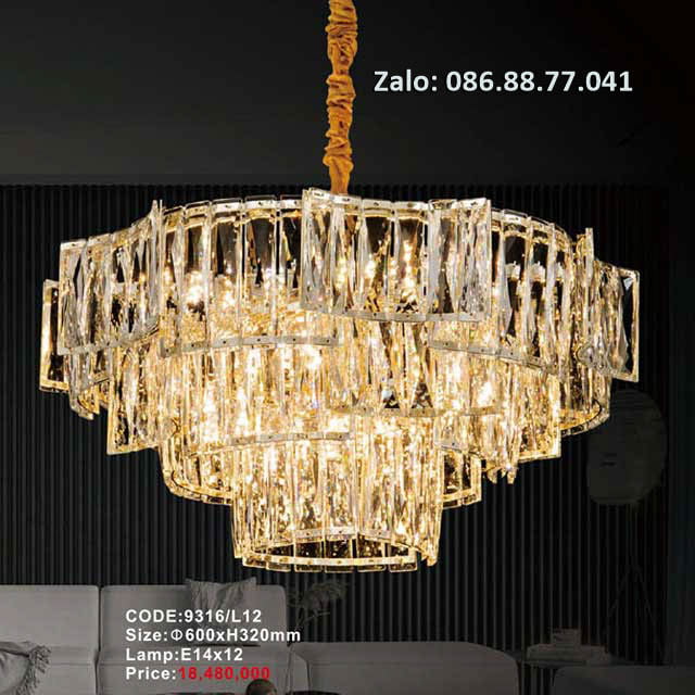 Đèn thả pha lê 9316/L12 1 Tên sản phẩm: Đèn thà pha lê trang trí Mã sản phẩm: 9316/L12 Kích thước: Ø600xH320mm Nguồn sáng: Lamp E14x12 Chất liệu: Hợp kim, Pha lê cao cấp loại 1